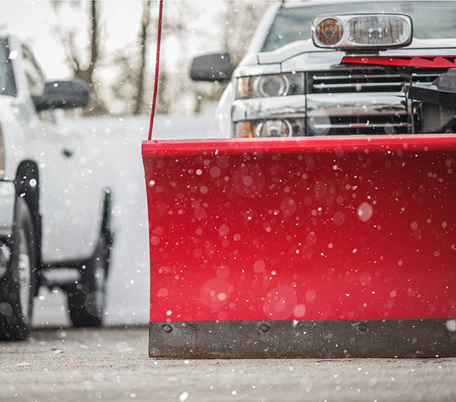 snow plow trucks in snow. Snow plowing Charlotte NC